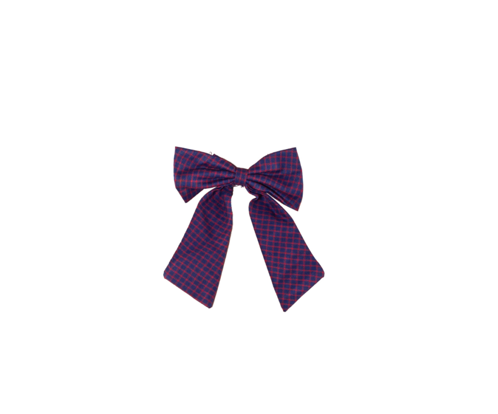 This Navy Blue Check Bow is a charming accessory that is likely part of the girls' uniform or used for special occasions at VVS English.