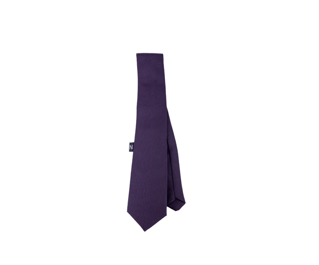 This purple tie is likely part of the school uniform at VVS Marathi. Ties are often used to create a more formal and professional appearance, especially in educational settings like VVS Marathi.