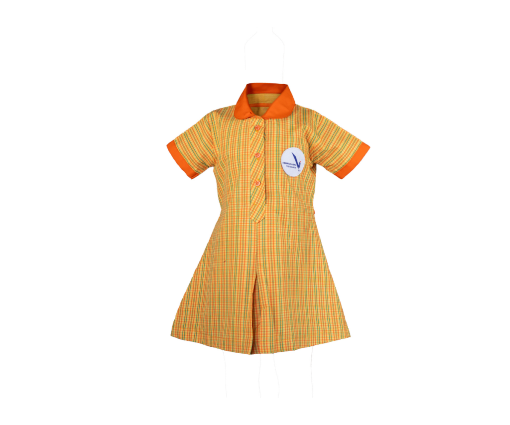 This Yellow Check Pino Frok is a cheerful and practical uniform dress for students at VVS Marathi. The yellow check pattern provides a bright and lively appearance, suitable for a school environment. The "Pino Frok" style likely refers to a specific design or cut of the dress, perhaps with a pinafore-like element. This Yellow Check Pino Frok is a recognizable and essential part of the VVS Marathi girls' uniform, contributing to a neat and unified appearance within the school.